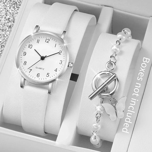 Leather bracelet watch with Arabic dial and pearls.