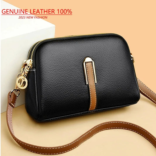 Designer cowhide messenger bag for women.