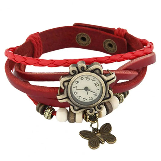 Vintage multilayer bracelet watch with butterfly accents.