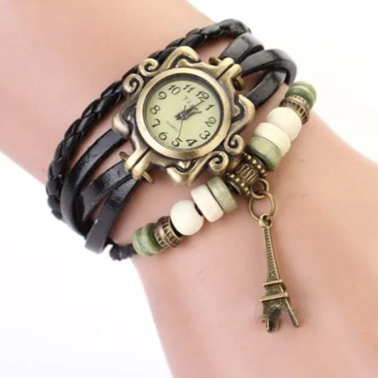 Vintage multilayer bracelet watch with butterfly accents.